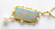 18k gold pendant with a solid crystal opal