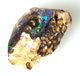 Polished boulder opal specimen
